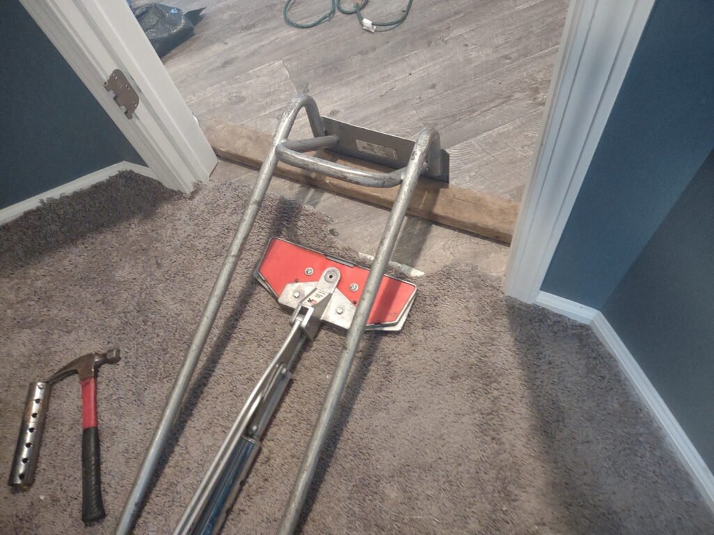 Stretching over carpet to repair from pet damage frayed